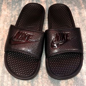 Brand new Nike slides. Size 10